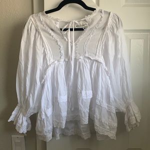White blouse ties in front and zipper in back
